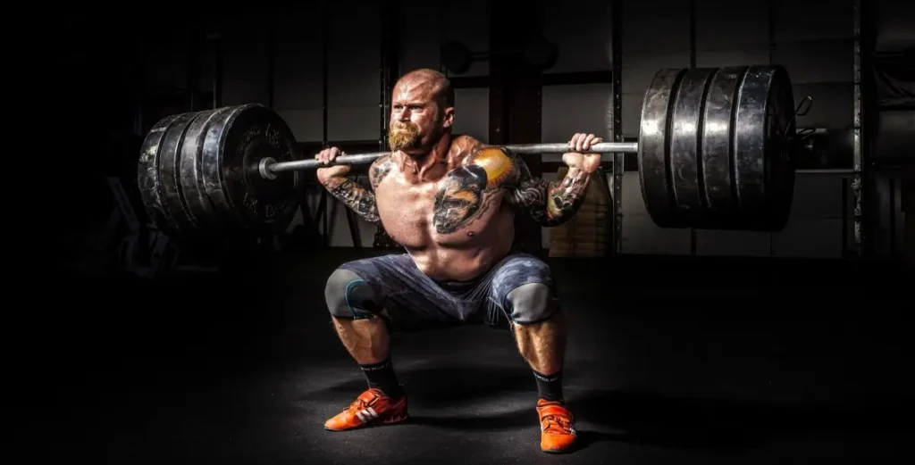 A bodybuilder doing squats