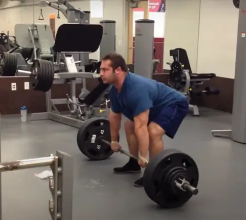 Old Picture of Dr Mike Israetel With Hair doing exercise